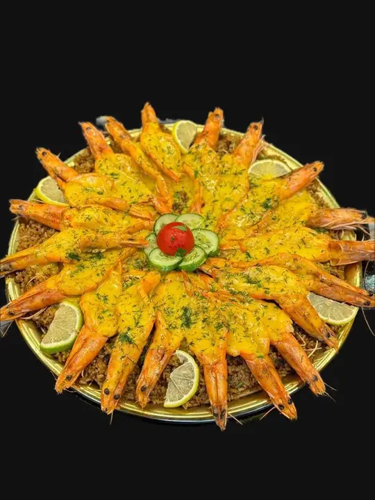 كيلو جمبري بترفلاي جامبو - عند طلب كيلو يقدم علي صينية + كيلو أرز صيادية و سلطات هدية